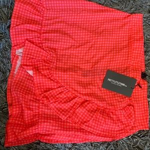 pink gingham frill hem wrap skirt